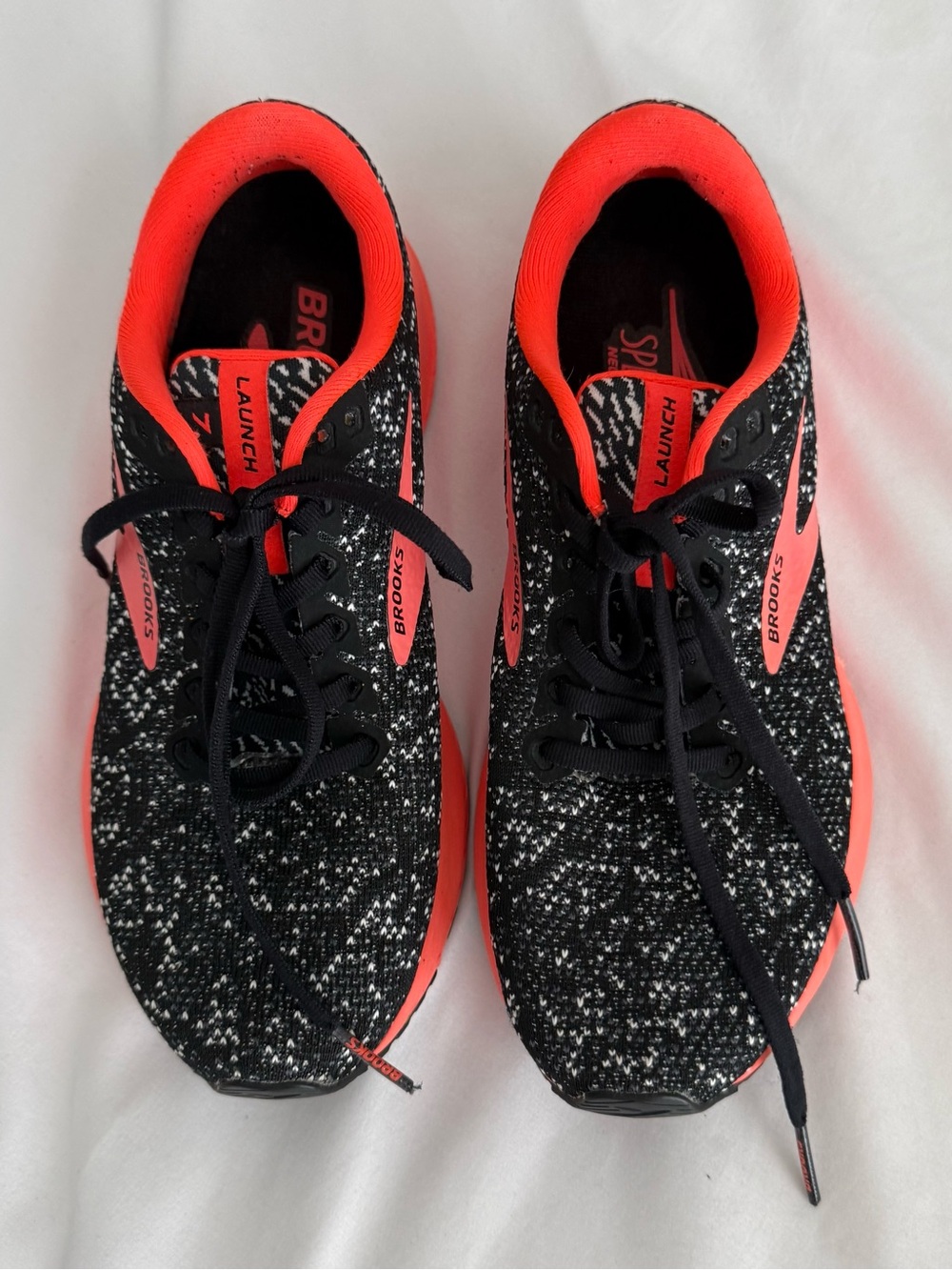 Brooks Women's Black and Coral/Neon Pink Launch Knit Running Shoes